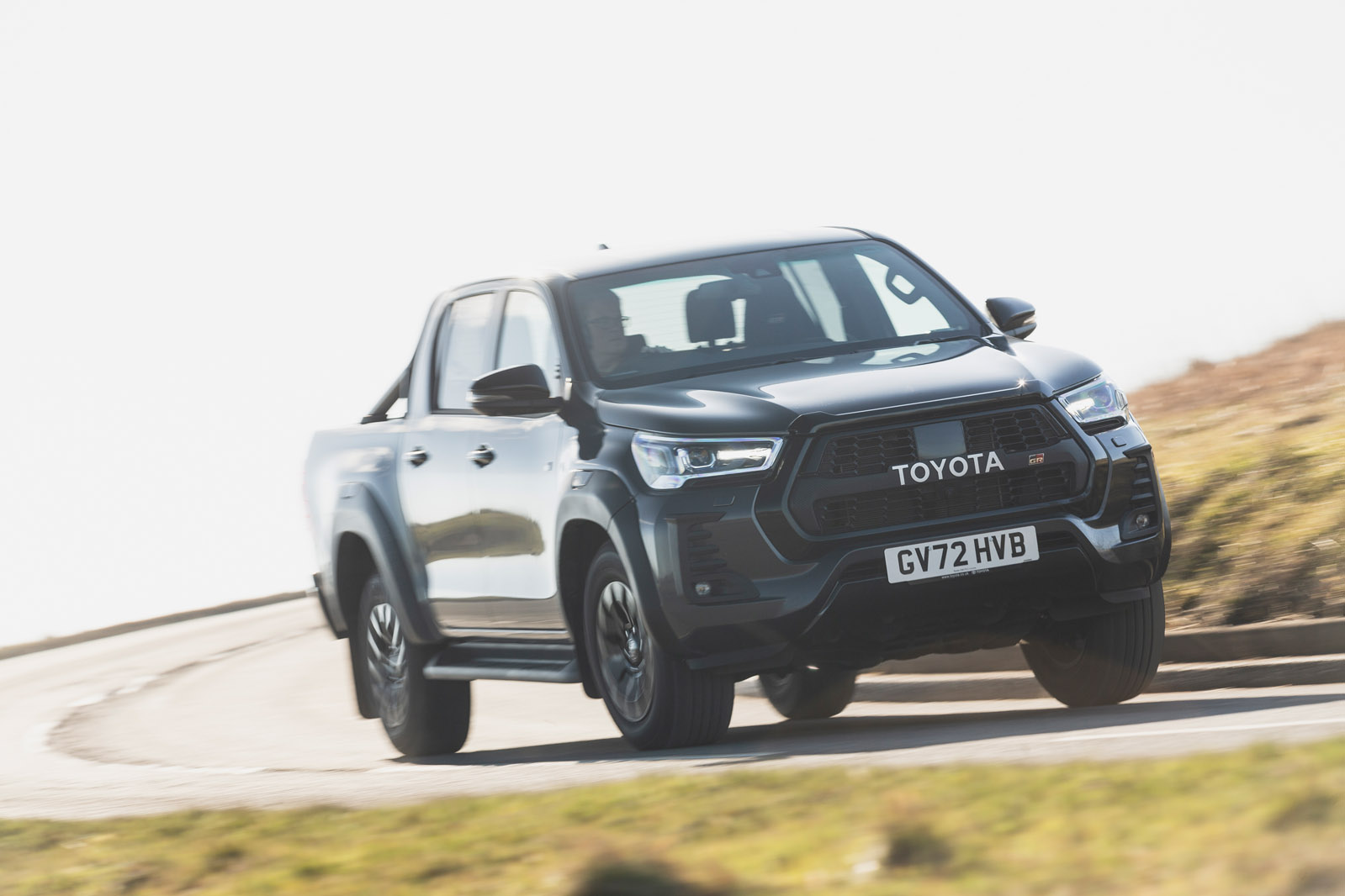 https://www.autocar.co.uk/sites/autocar.co.uk/files/19-toyota-hilux-gr-sport-rt-2023-cornering-front.jpg