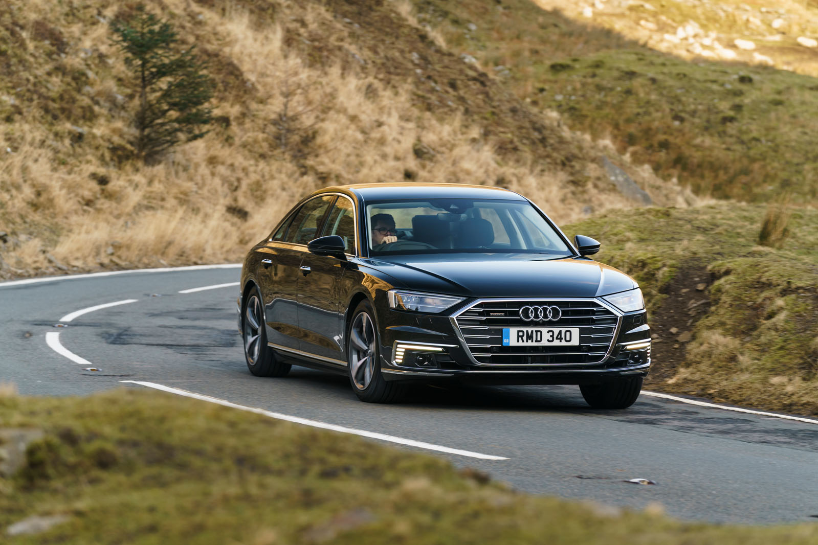 Audi A8 60 TFSIe 2020 road test review - cornering front