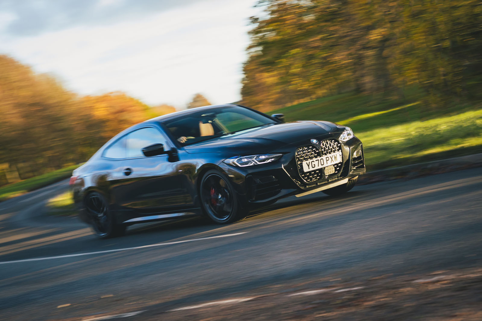 26 BMW 4 Series M440i road test review 2021 cornering front