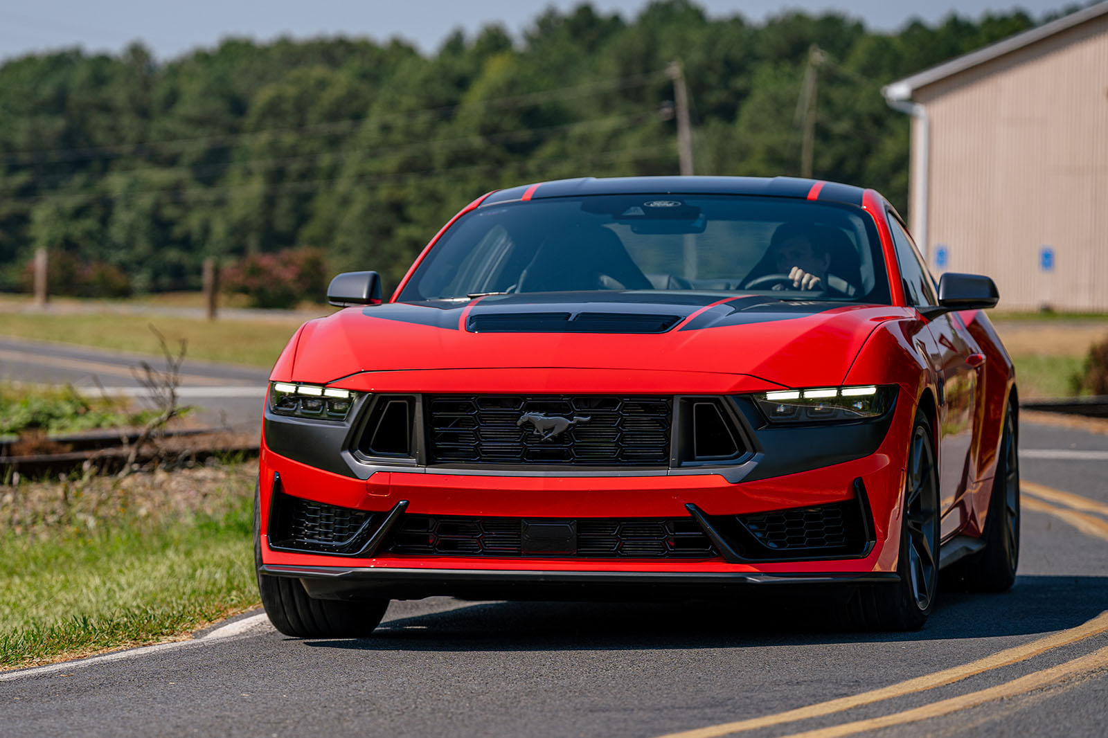 https://www.autocar.co.uk/sites/autocar.co.uk/files/ford-mustang-dark-horse-review-202301-cornering-front.jpg