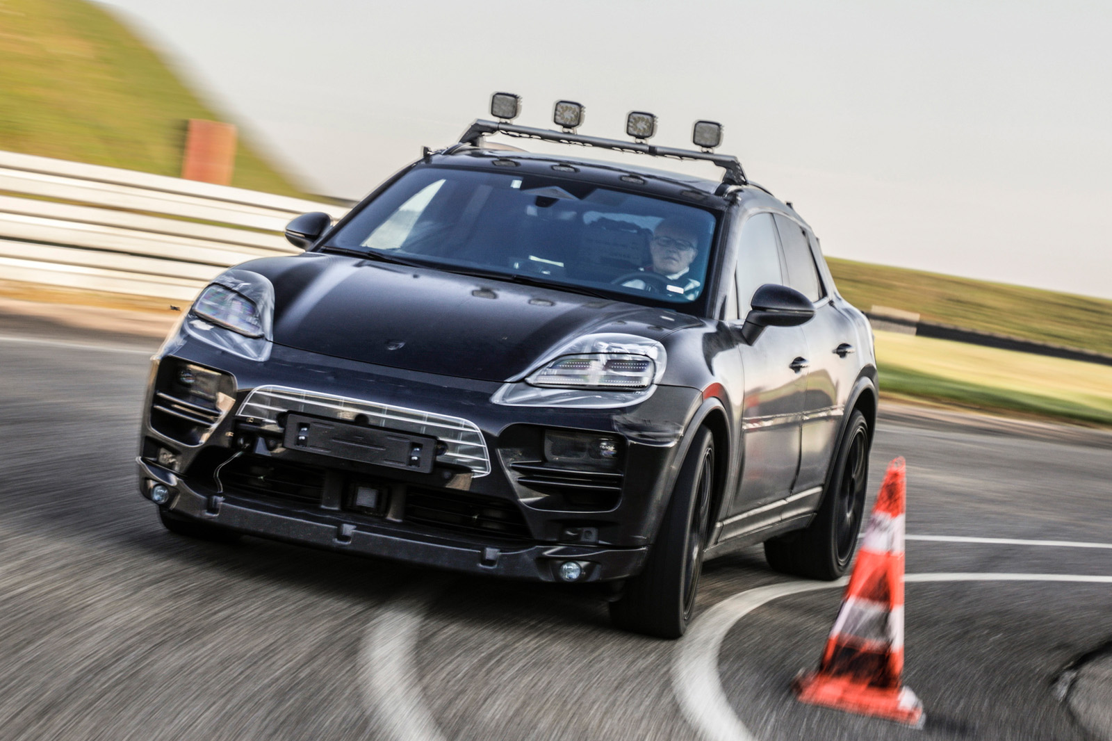 New 2023 Porsche Macan EV shown testing in official images Autocar