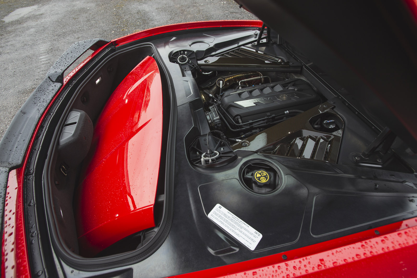 Rear interior view of the EU version of the C8 Corvette in Torch Red.