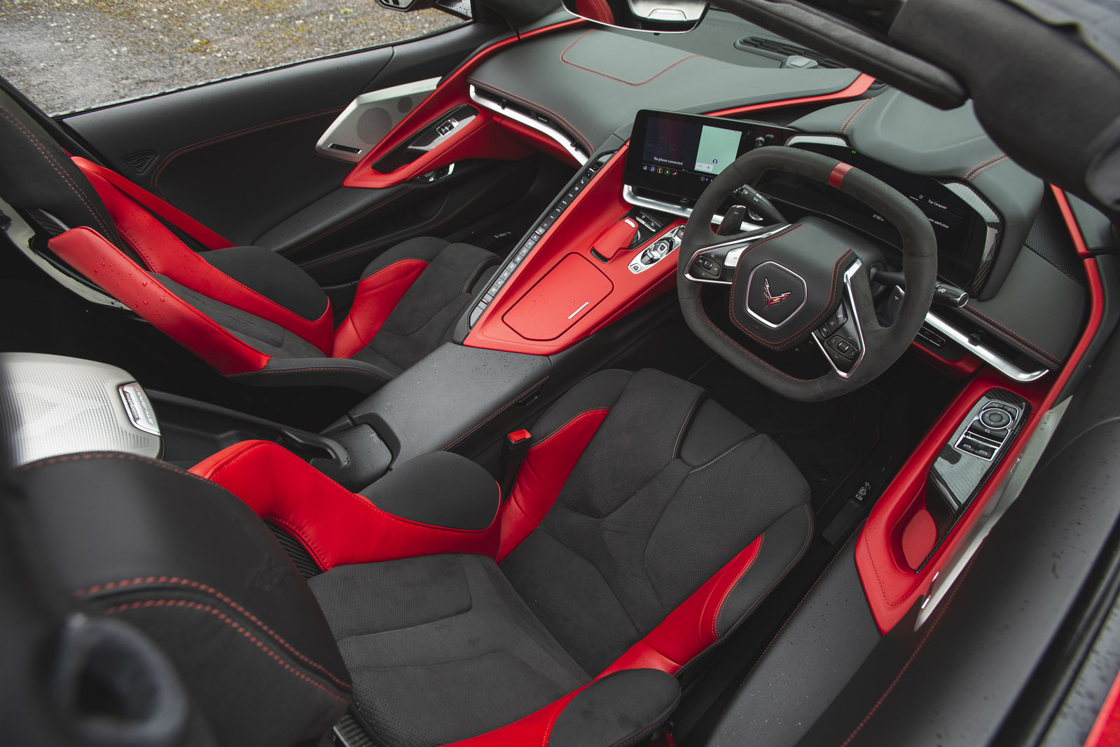 Interior view of the EU version of the C8 Corvette black and red interior.