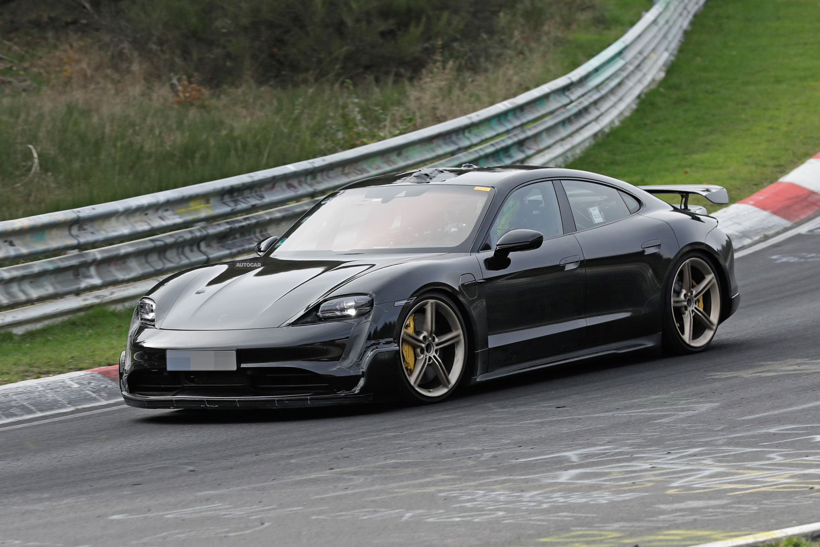 Updated, high-performance Porsche Taycan spotted testing