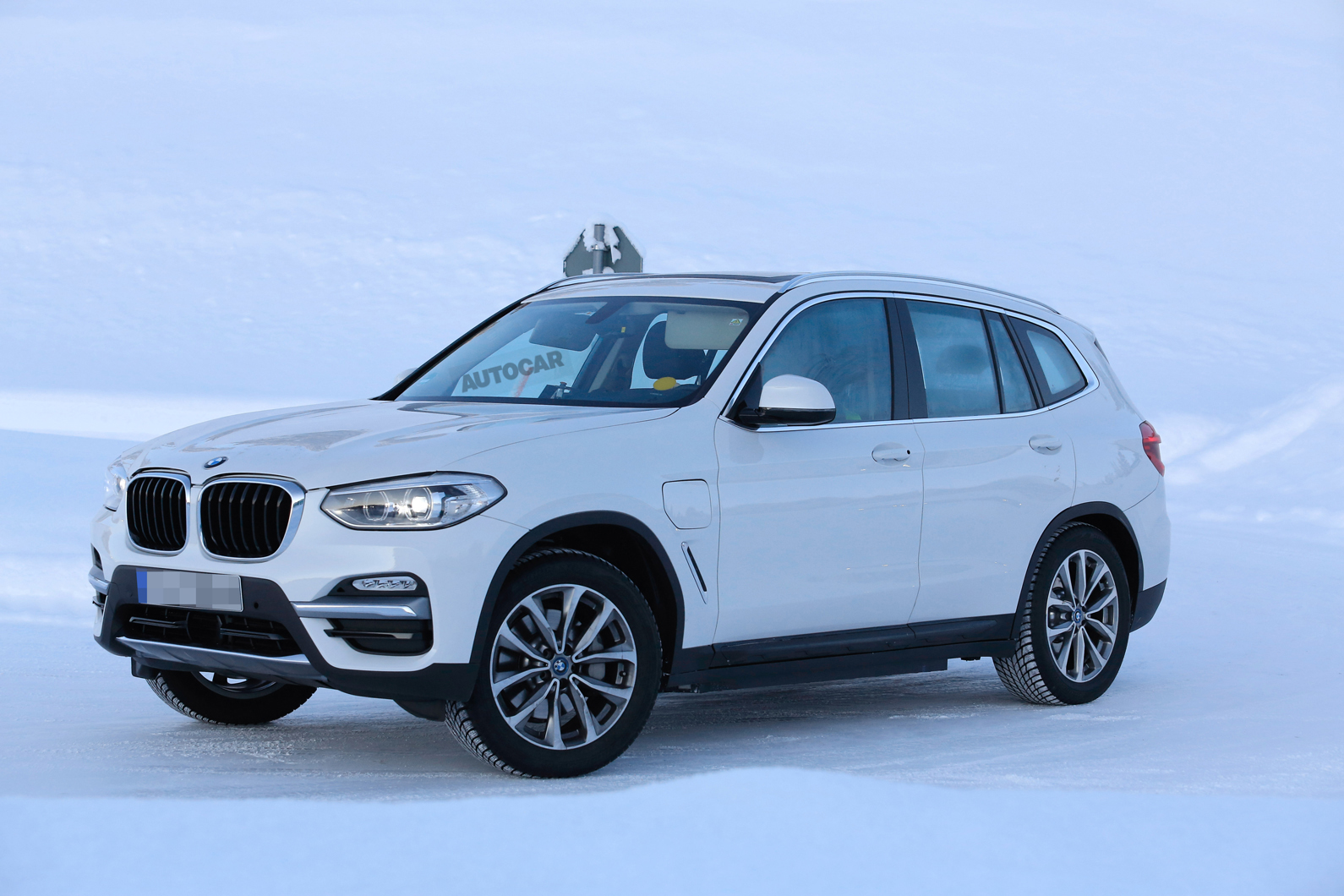 BMW iX3 first preview pictures of upcoming electric SUV Autocar