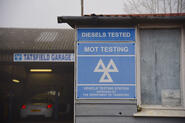 MOT sign at garage