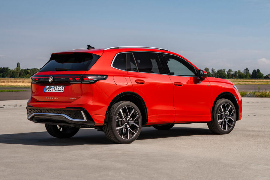 Red 2023 Volkswagen Tiguan â€“ rear quarter parked