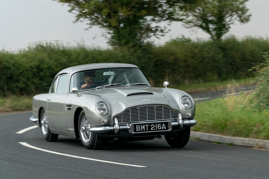 aria-label="82 aston martin db5 goldfinger road test 2021 cornering front 0"