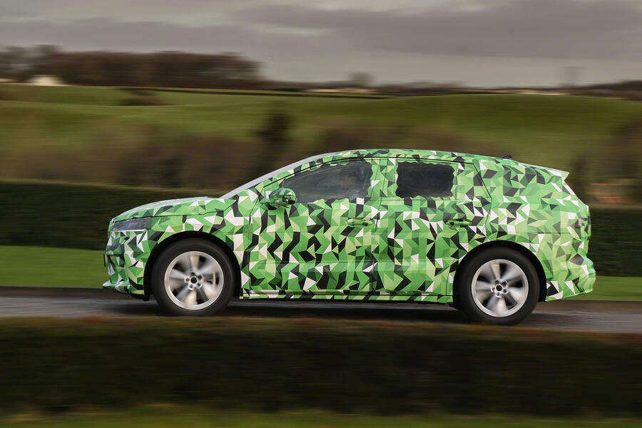 aria-label="98 skoda enyaq camo drive 2020 hero side"