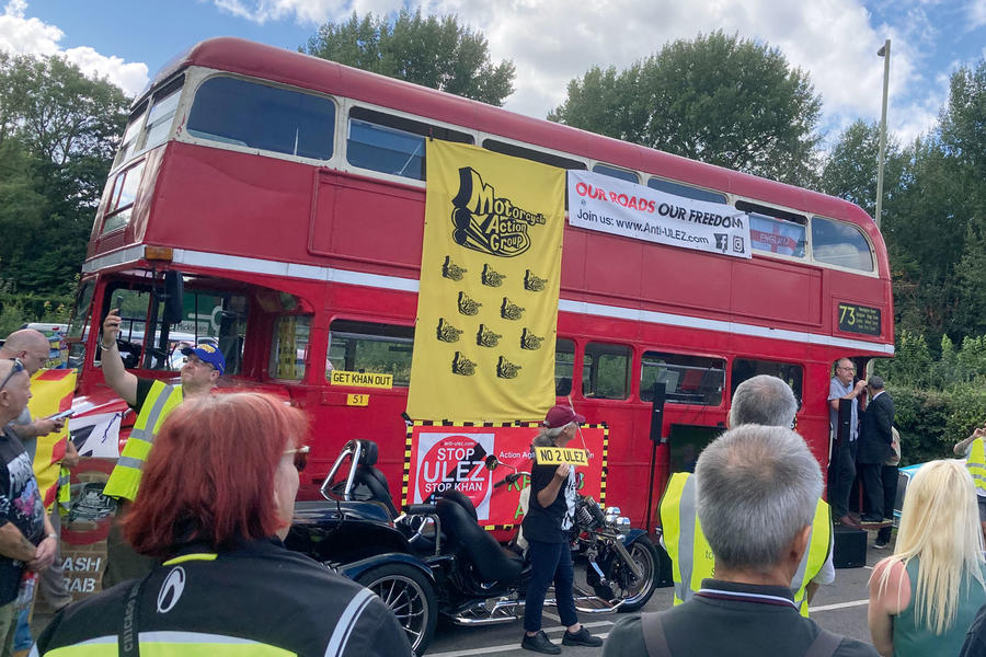 Bus with Motorcycle Action Group banner