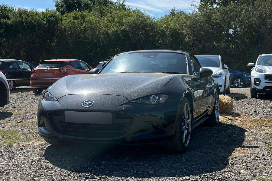 Charlie Martin Mazda MX-5 in a dusty car park