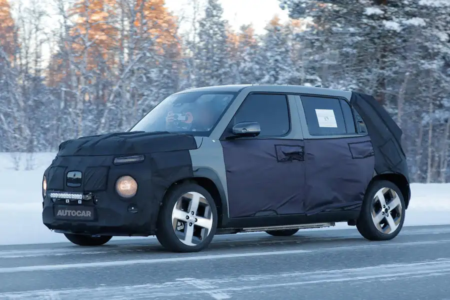 Hyundai Casper camouflaged driving front quarter 