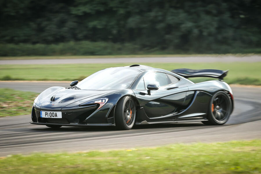 McLaren P1 front quarter sliding through corner