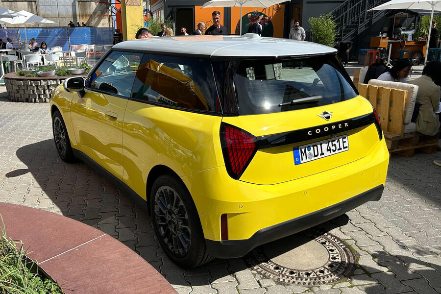 Mini Cooper Electric 2024 yellow rear quarter