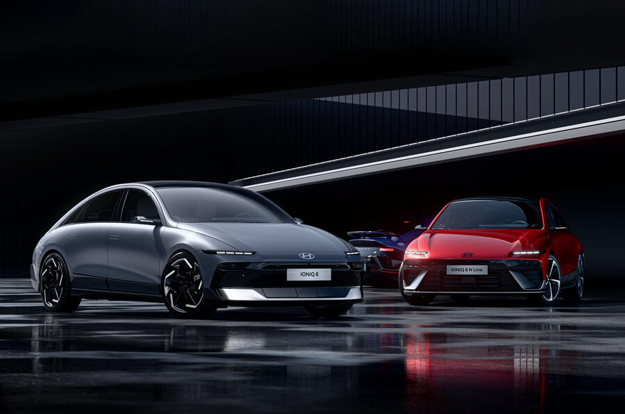 new 2025 hyundai ioniq 6 in grey and ioniq 6 n line in red with ioniq 6 n in the background