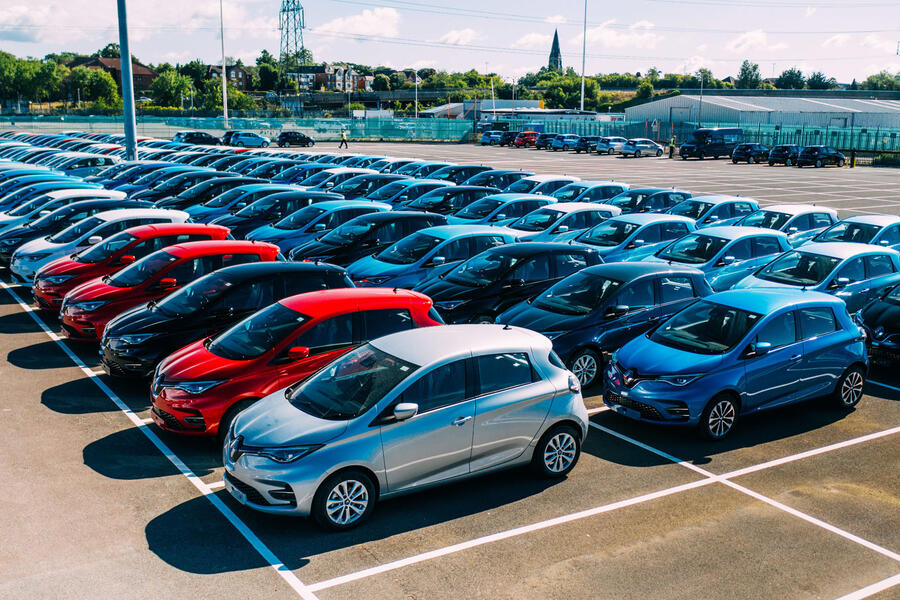 A Fleet of Onto Renault Zoes parked at an industrial site