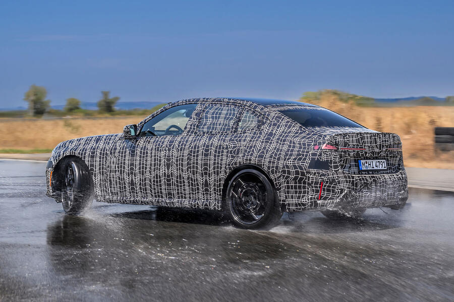 BMW 3 Series M350 sliding on a wet track &ndash; rear