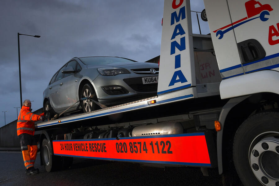 Vauxhall astra 2014 on recovery truck front quarter static