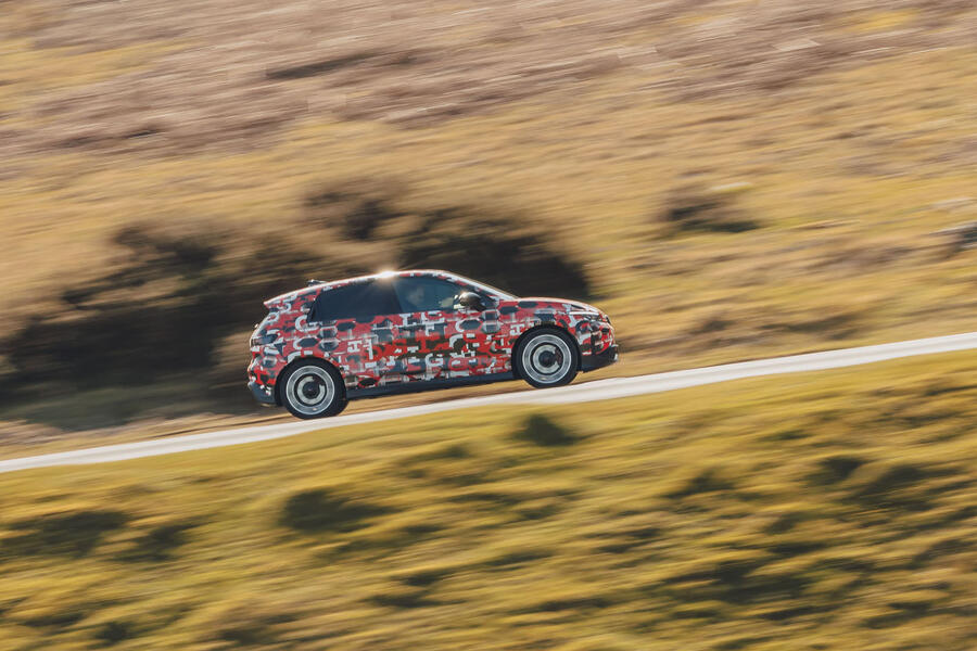 VW ID Polo GTI driving, viewed from the side