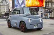 Citroen Ami in London front three quarters on Piccadilly Circus Citroen Ami in London front three quarters on Piccadilly Circus