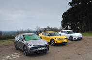 Cupra Tavascan, Ford Capri and Kia EV6 in car park