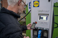 Man using Lidl electric car charger 2021 Man using Lidl electric car charger 2021