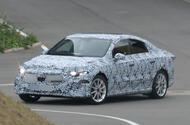 Mercedes C Class EV camo front quarter