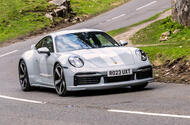 porsche 911 sport classic 2023 01 cornering front porsche 911 sport classic 2023 01 cornering front
