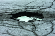 Pothole full of water Pothole full of water