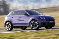 Purple Abarth 600e drifting   front three quarters