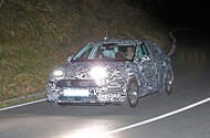 The new Seat Leon being tested under a camouflage wrap