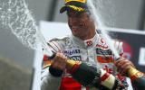 Button triumphs in Canada classic