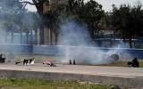 Racer unhurt in huge crash - pics