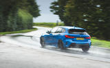 BMW 1 Series 118i 2019 road test review - on the road rear