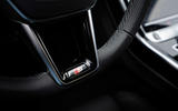 11 Audi A8 TFSIe 2022 first drive review steering wheel badge