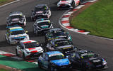 A tight pack of BTCC cars cornering