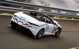 Jaguar F-Type rally car 2019 driven on the road rear