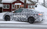 BMW 2 Series camouflage winter testing 2019 - leaving petrol station