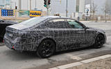 94 2024 BMW M5 hybrid spy images driving