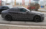 96 2024 BMW M5 hybrid spy images side