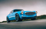 Cyan Volvo P1800 drive - hero front