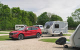 99 skoda enyaq iv 80 side view towing caravan