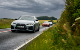 The BMW i4 M50 leads the way as our convoy heads to the Goodwood Festival Of Speed