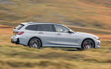 bmw 330e xdrive touring 02 side panning