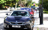 BMW i8 and Tesla Model S on street charging