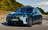 BMW iX 2025 xDrive 60 M Sport front qtr tracking