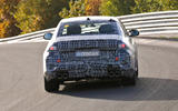 BMW M5 spied driving track rear 1