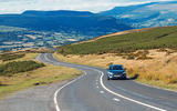 Ford Focus driving on a country road