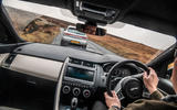 Porsche Macan vs Jaguar E-Pace 2019 - Jaguar driving inside cabin