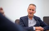 Volkswagen boss Herbert Diess talks to Autocar